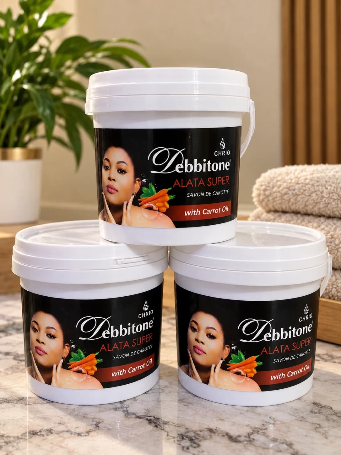 Three buckets of Debbitone Carrot Lightening Alata Super Soap stacked together